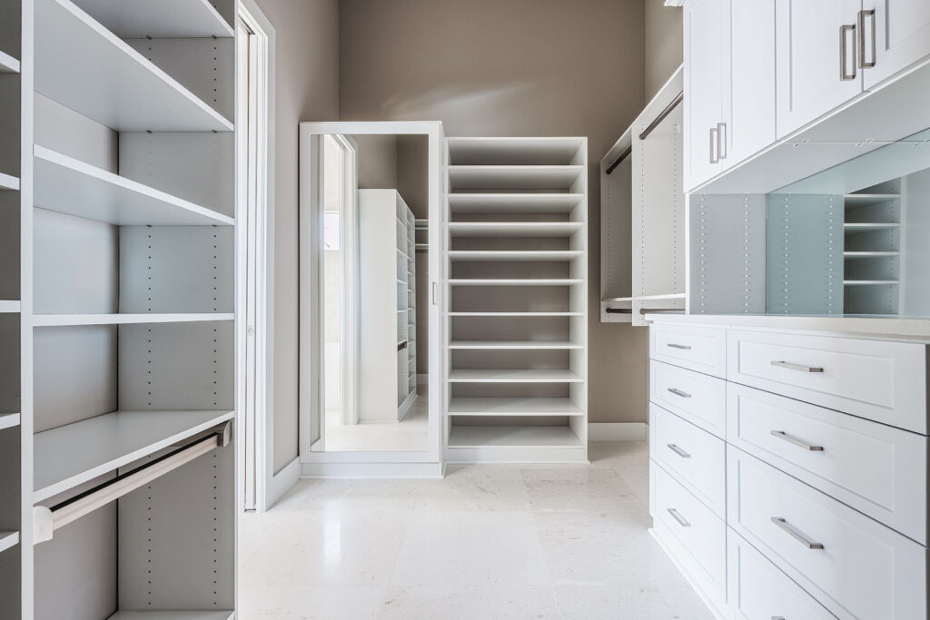 Custom closet in Cape Coral home with built-in storage